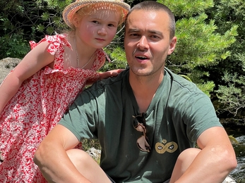 a person and a child sat down