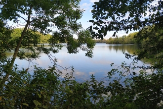 Former quarry, now lake at Denham Lock Woods in Uxbridge