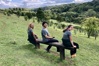 Volunteers on bench at Hutchinson's Bank