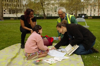 A family enjoying a spring event at Grosvenor Square