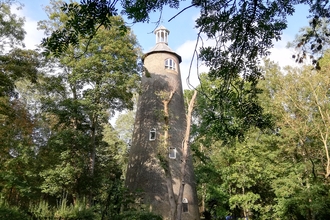 View of the tall Shot Tower Building at Crane park