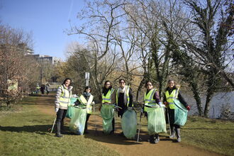 Some volunteers with litter pickers and bags 