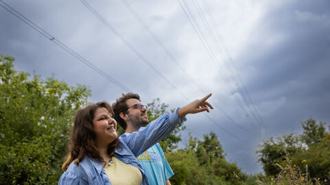 Two people looking out at Walthamstow Wetlands