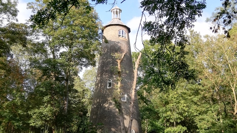 View of the tall Shot Tower Building at Crane park