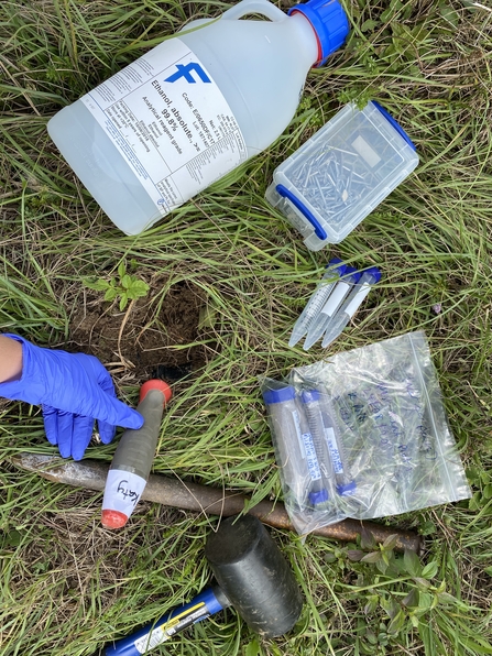 Various survey equipment on grass