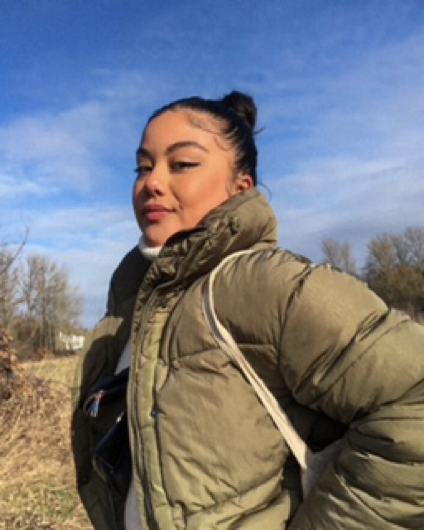 Young person in grassland