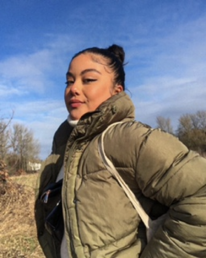 Young person in grassland 