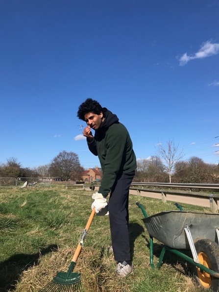 A young Keeping it Wild Trainee carrying out practical conservation on site