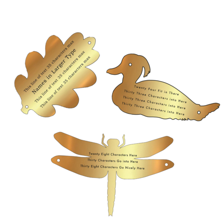 Plaques of a oak leaf, tufted duck and dragonfly