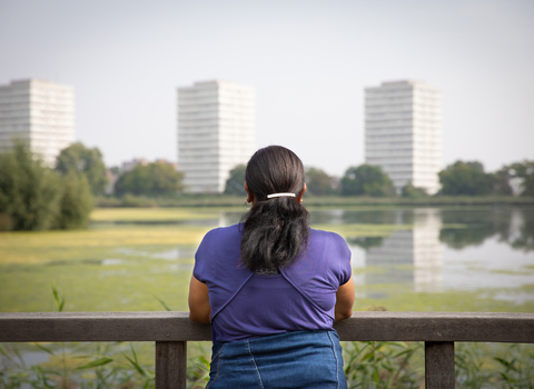 Person looking out at Woodberry Wetlands